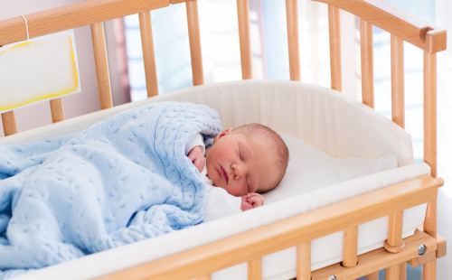 baby in warm crib
